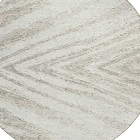 8' Ivory And Beige Round Abstract Washable Indoor Outdoor Area Rug Photo 4