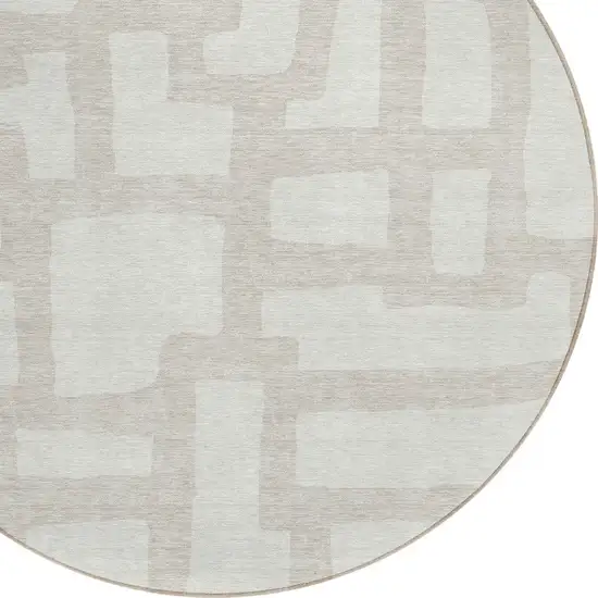 8' Ivory And Beige Round Abstract Washable Indoor Outdoor Area Rug Photo 4