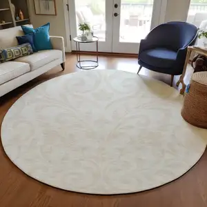 Photo of 8' Ivory And Beige Round Floral Washable Indoor Outdoor Area Rug
