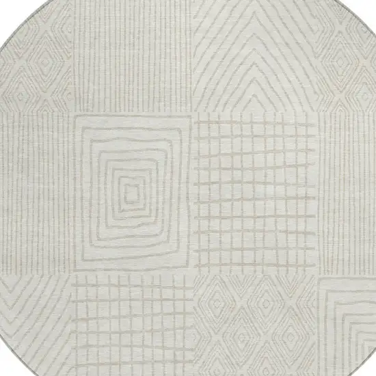 8' Ivory And Beige Round Geometric Washable Indoor Outdoor Area Rug Photo 4