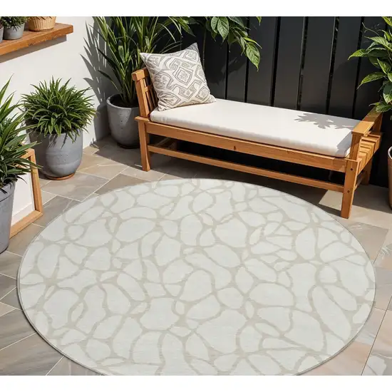 8' Ivory And Beige Round Geometric Washable Indoor Outdoor Area Rug Photo 1
