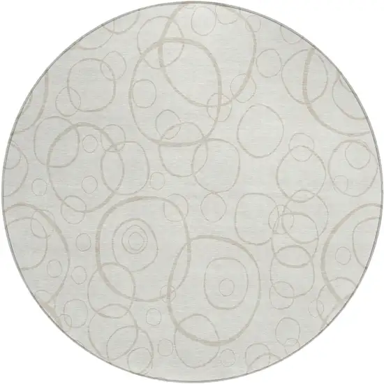8' Ivory And Beige Round Geometric Washable Indoor Outdoor Area Rug Photo 1