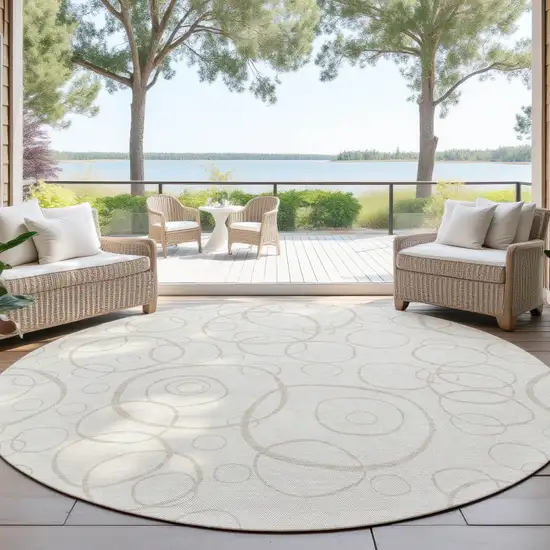 8' Ivory And Beige Round Geometric Washable Indoor Outdoor Area Rug Photo 4