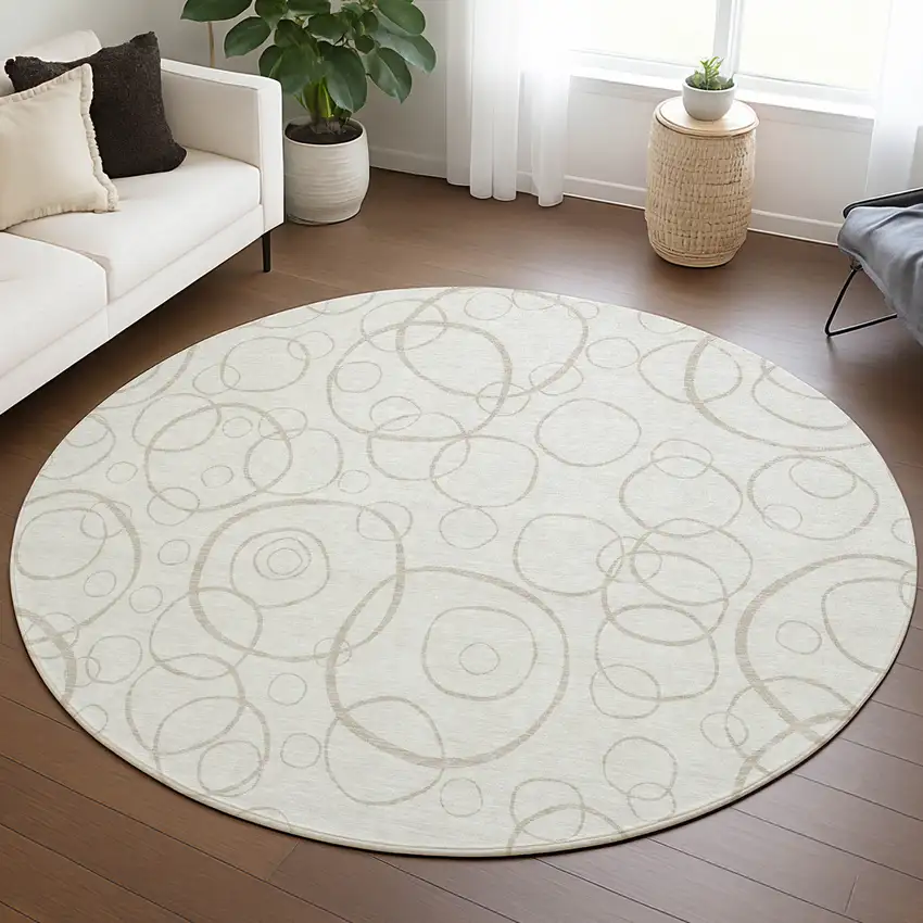 8' Ivory And Beige Round Geometric Washable Indoor Outdoor Area Rug Photo 5