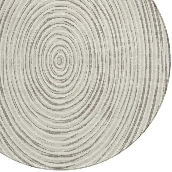 8' Ivory And Beige Round Geometric Washable Indoor Outdoor Area Rug Photo 4