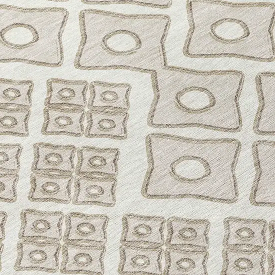 8' Ivory And Beige Round Geometric Washable Indoor Outdoor Area Rug Photo 8