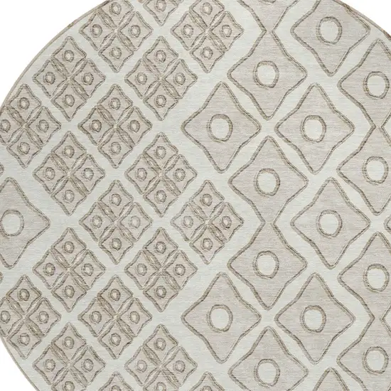 8' Ivory And Beige Round Geometric Washable Indoor Outdoor Area Rug Photo 4