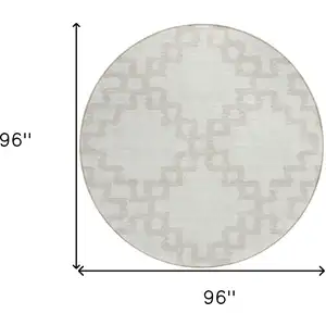 Photo of 8' Ivory And Beige Round Geometric Washable Indoor Outdoor Area Rug