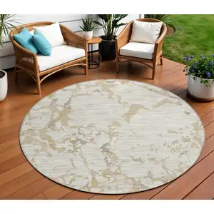 Photo of 8' Ivory And Beige Round Striped Washable Indoor Outdoor Area Rug