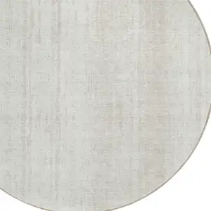 Photo of 8' Ivory And Beige Round Striped Washable Indoor Outdoor Area Rug