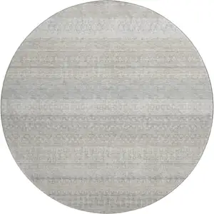 Photo of 8' Ivory And Beige Striped Washable Round Rug With UV Protection