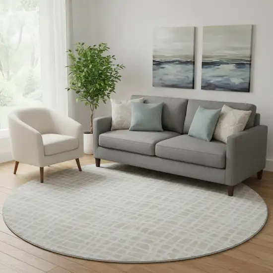 8' Ivory And Beige Striped Washable Round Rug With UV Protection Photo 1