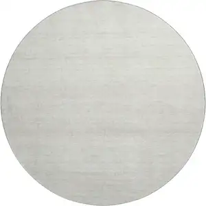 Photo of 8' Ivory And Beige Striped Washable Round Rug With UV Protection