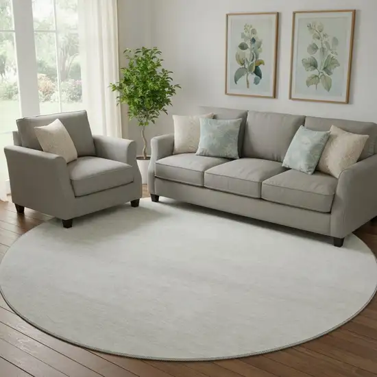 8' Ivory And Beige Striped Washable Round Rug With UV Protection Photo 1