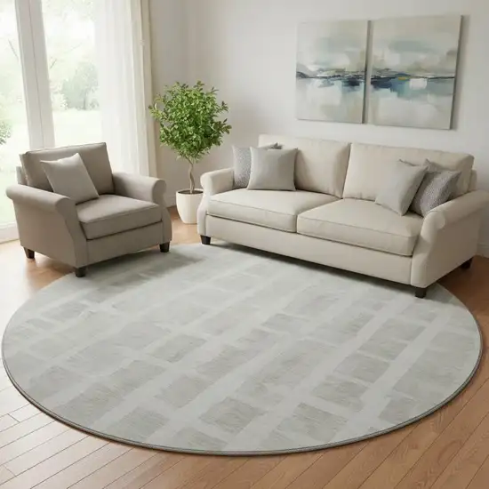 8' Ivory And Beige Striped Washable Round Rug With UV Protection Photo 1