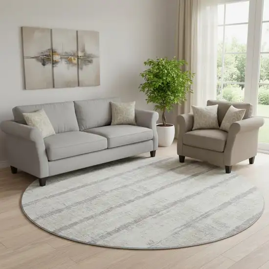 8' Ivory And Beige Striped Washable Round Rug With UV Protection Photo 1