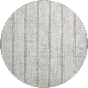 Photo of 8' Ivory And Beige Striped Washable Round Rug With UV Protection