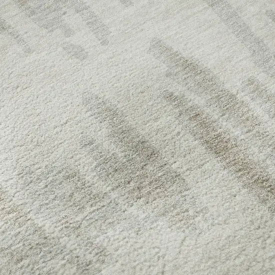 8' Ivory And Beige Striped Washable Round Rug With UV Protection Photo 8