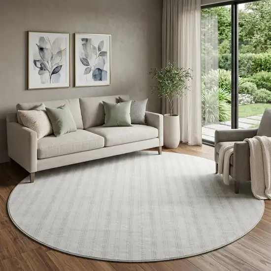 8' Ivory And Beige Striped Washable Round Rug With UV Protection Photo 1