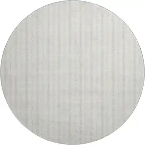 Photo of 8' Ivory And Beige Striped Washable Round Rug With UV Protection