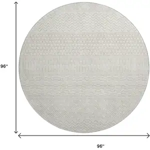 Photo of 8' Ivory And Beige Striped Washable Round Rug With UV Protection