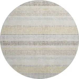 Photo of 8' Ivory And Beige Striped Washable Round Rug With UV Protection