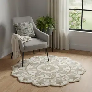 Photo of 4' Ivory And Beige Wool Medallion Hand Tufted Round Rug