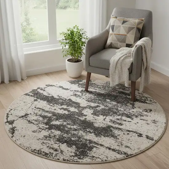 5' Ivory And Black Abstract Non Skid Round Rug Photo 1