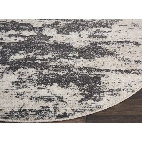 5' Ivory And Black Abstract Non Skid Round Rug Photo 9