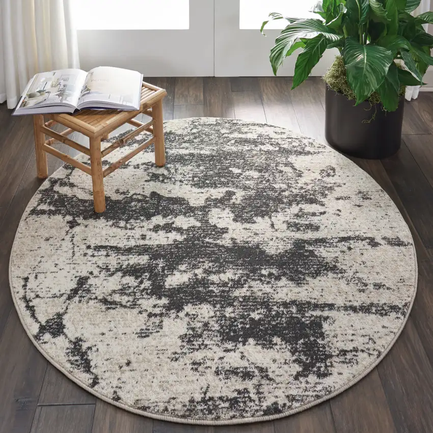 5' Ivory And Black Abstract Non Skid Round Rug Photo 5