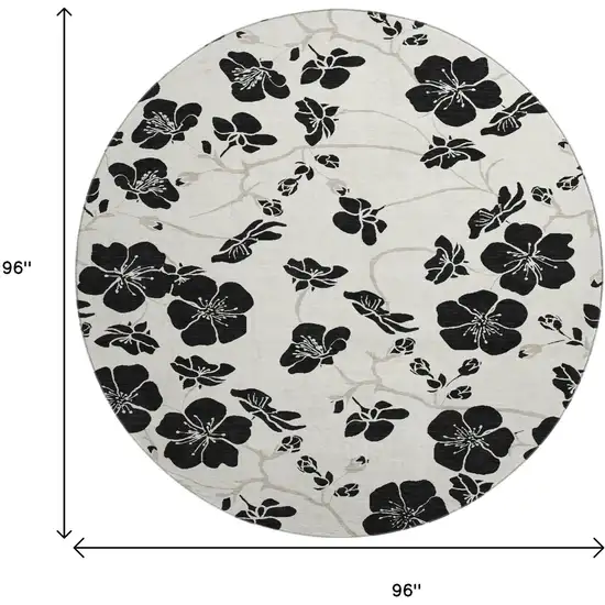 8' Ivory And Black Floral Washable Round Rug With UV Protection Photo 9