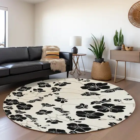 8' Ivory And Black Floral Washable Round Rug With UV Protection Photo 4