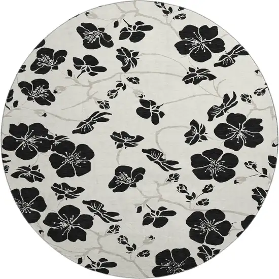 8' Ivory And Black Floral Washable Round Rug With UV Protection Photo 1