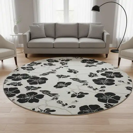 8' Ivory And Black Floral Washable Round Rug With UV Protection Photo 2