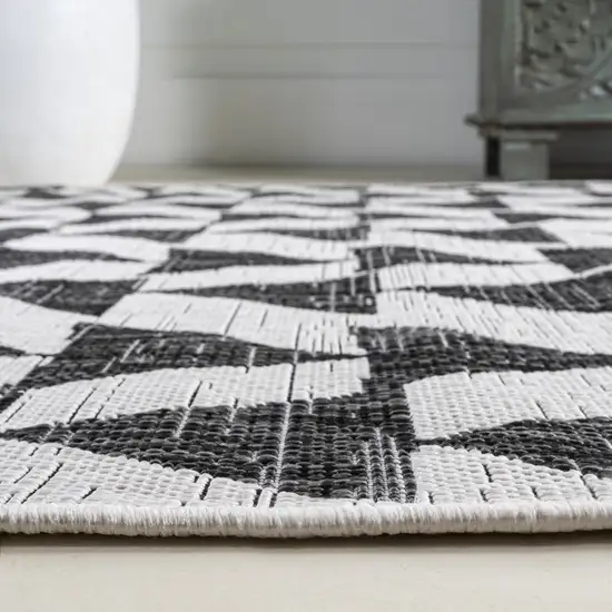 10' Ivory And Black Geometric Indoor Outdoor Runner Rug Photo 8