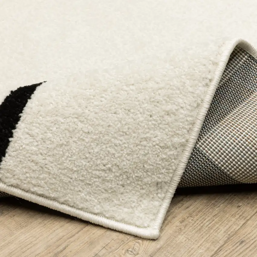 7' Ivory And Black Geometric Runner Rug Photo 8