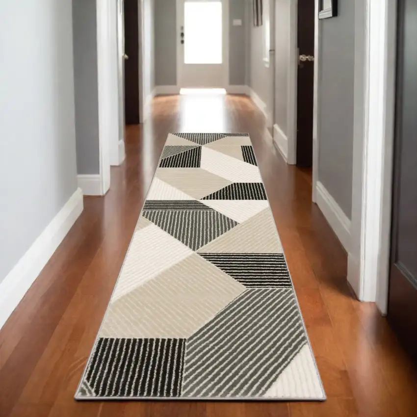 8' Ivory And Black Geometric Runner Rug Photo 1