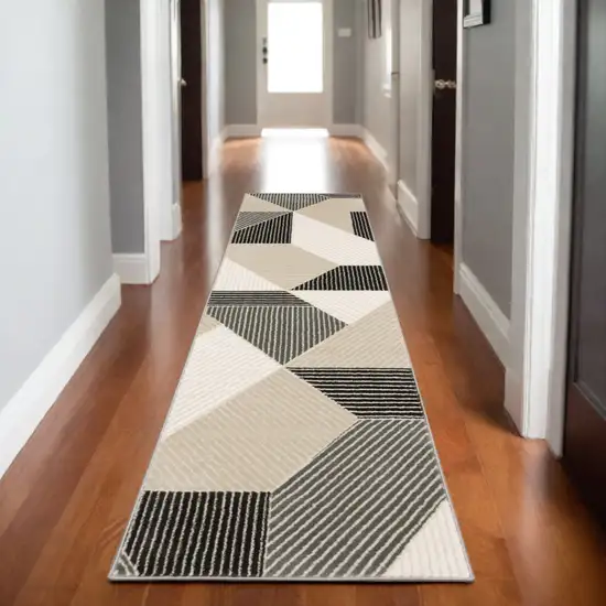 8' Ivory And Black Geometric Runner Rug Photo 1