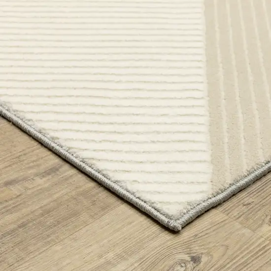 8' Ivory And Black Geometric Runner Rug Photo 7