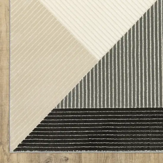 8' Ivory And Black Geometric Runner Rug Photo 9