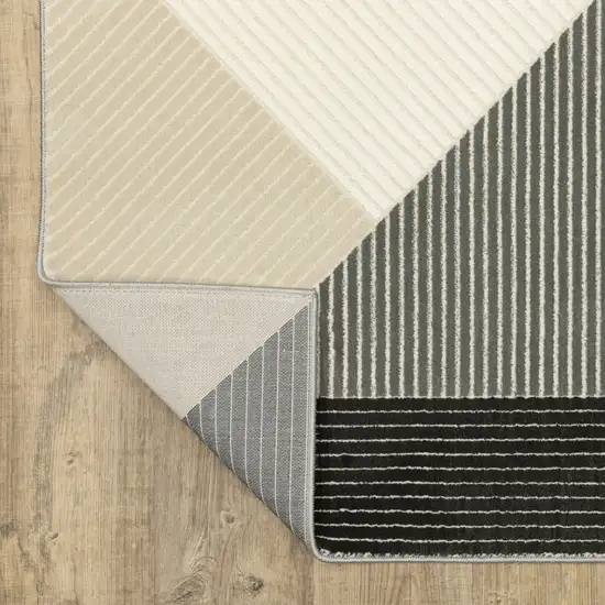 8' Ivory And Black Geometric Runner Rug Photo 9