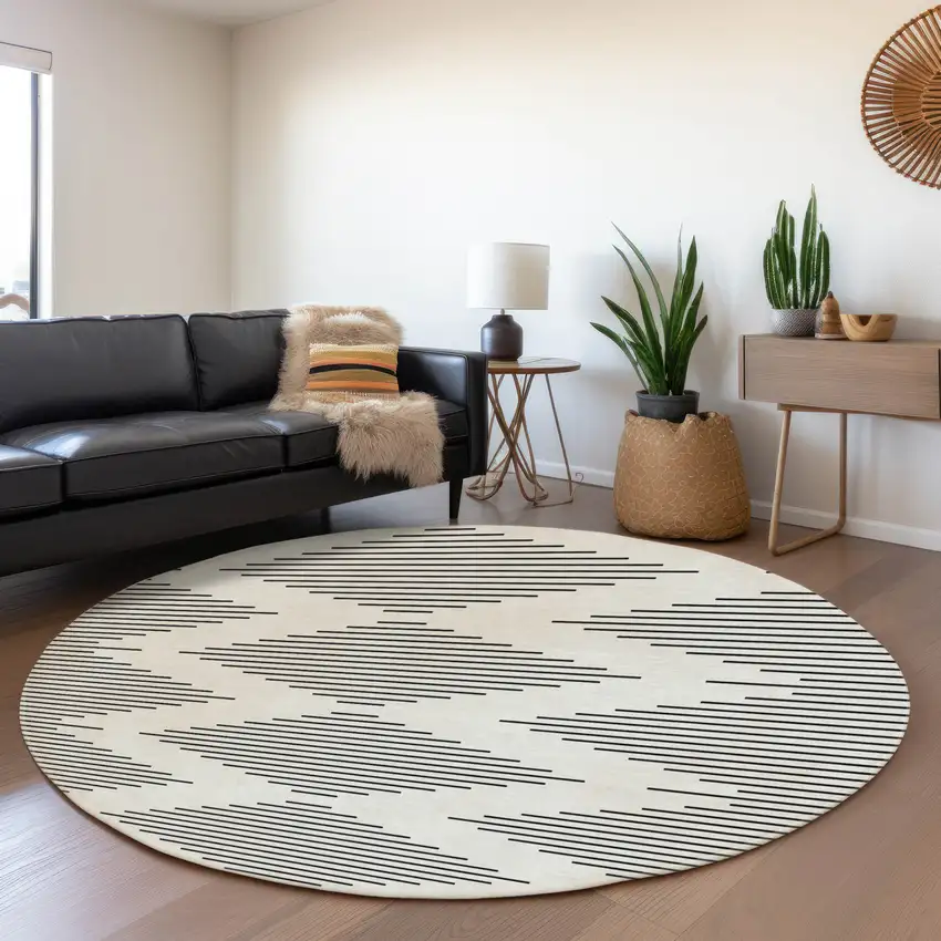 8' Ivory And Black Geometric Washable Round Rug With UV Protection Photo 3