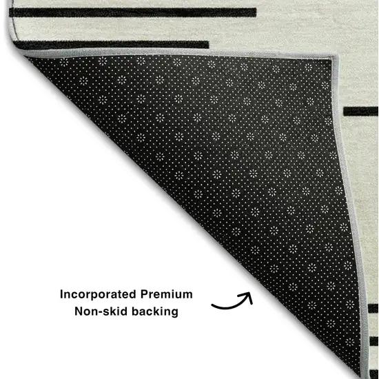8' Ivory And Black Geometric Washable Round Rug With UV Protection Photo 4