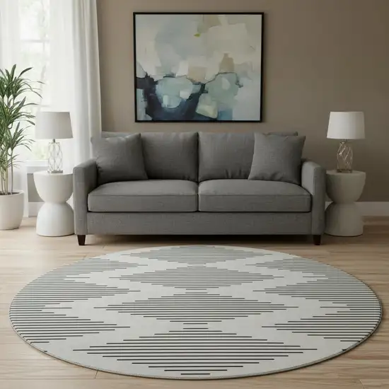 8' Ivory And Black Geometric Washable Round Rug With UV Protection Photo 2