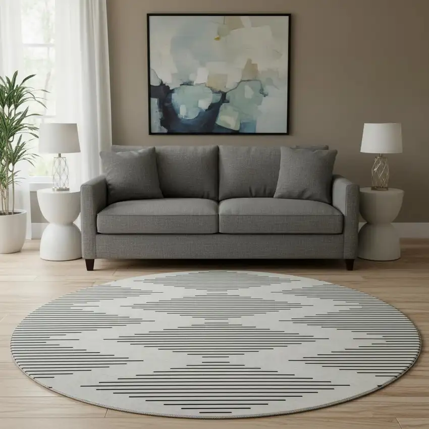 8' Ivory And Black Geometric Washable Round Rug With UV Protection Photo 2