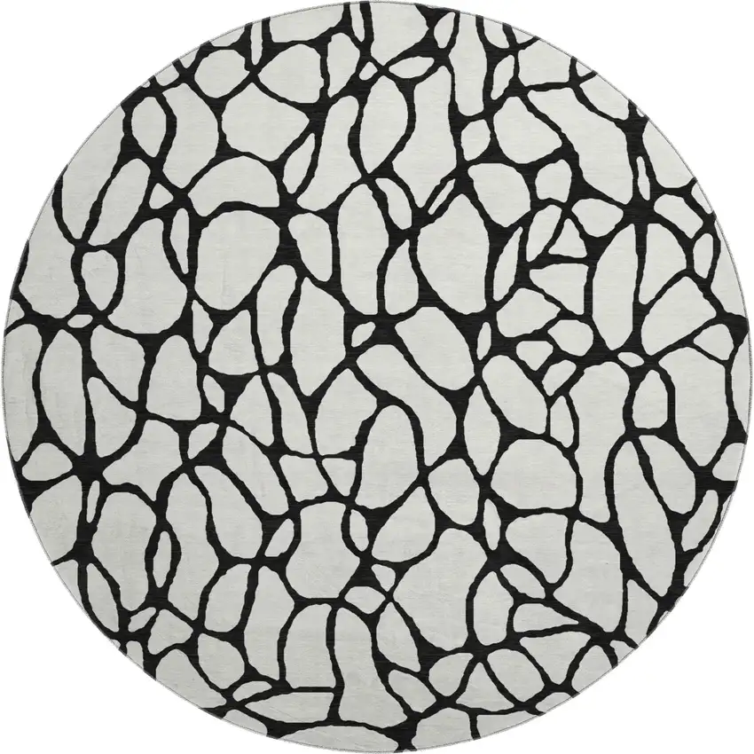 8' Ivory And Black Geometric Washable Round Rug With UV Protection Photo 1