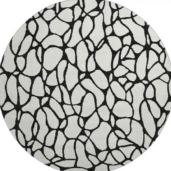 8' Ivory And Black Geometric Washable Round Rug With UV Protection Photo 2