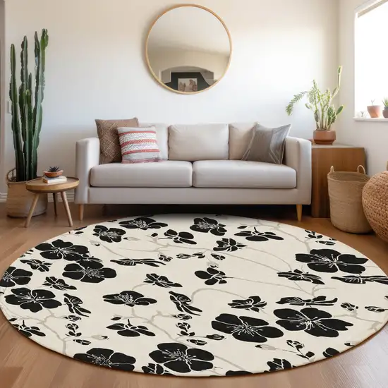8' Ivory And Black Round Floral Washable Indoor Outdoor Area Rug Photo 7