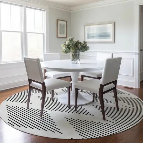 8' Ivory And Black Round Geometric Washable Indoor Outdoor Area Rug Photo 6