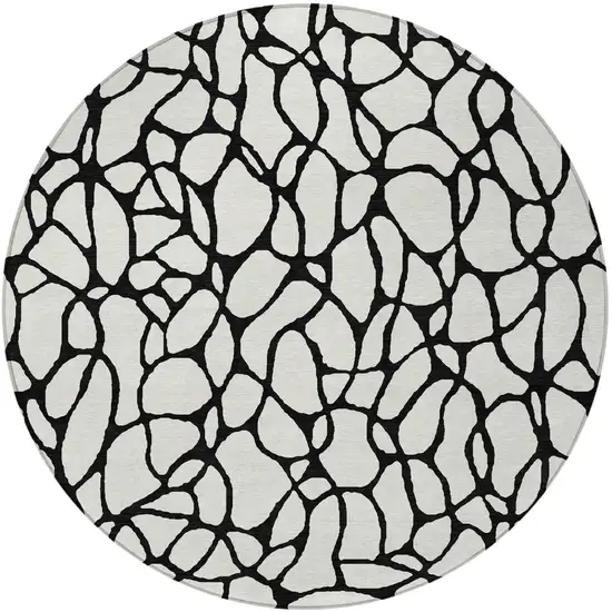 8' Ivory And Black Round Geometric Washable Indoor Outdoor Area Rug Photo 5